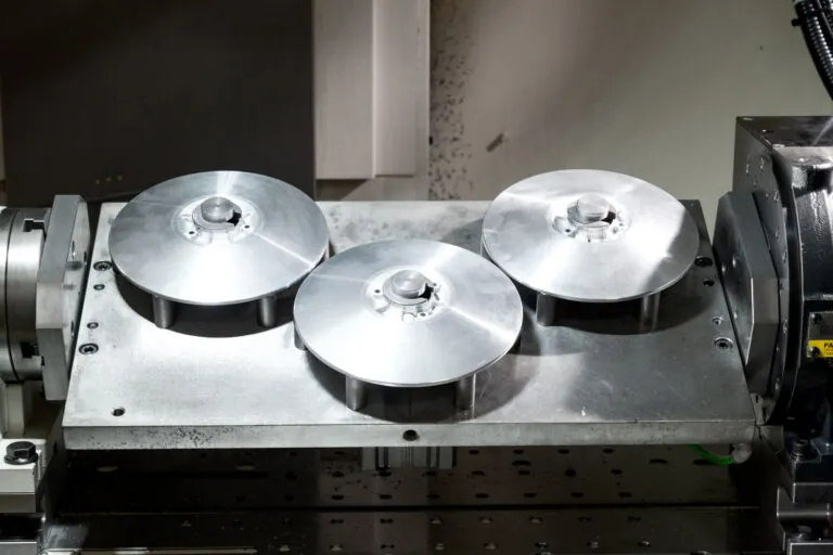 Precision-turned aluminum components showcasing fine surface finish and clean geometric profiles after CNC machining.