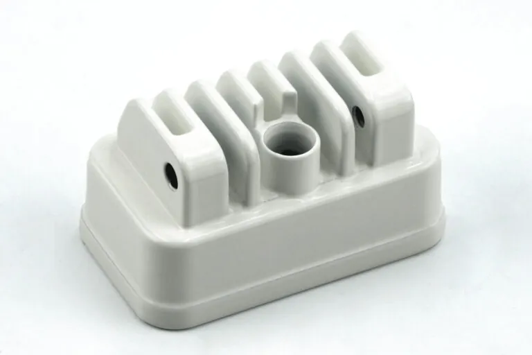 Custom black and white liquid coating on aluminum die cast LED housings, providing aesthetic finishes and durable protection for OEM products.