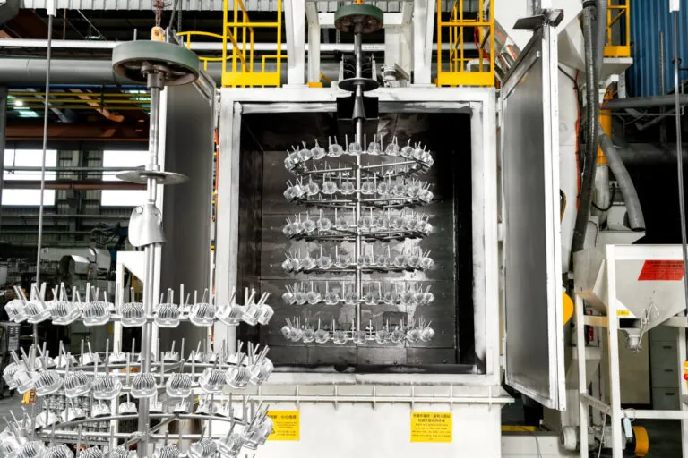 Automated shot blasting system at JoinCast’s Taiwan facility providing uniform surface texturing and scale removal for mass-produced aluminum components