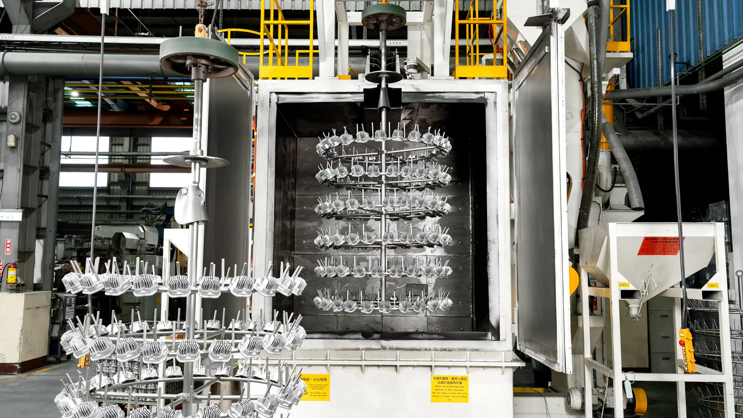 Automated shot blasting system at JoinCast’s Taiwan facility providing uniform surface texturing and scale removal for mass-produced aluminum components