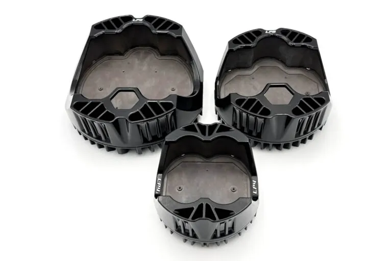 Professionally finished black aluminum die-cast enclosures showcasing high-quality surface coating and precise integrated mounting features.