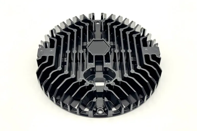 High-density radial cooling fin arrangement on an aluminum die-cast base, engineered for optimal heat transfer in high-power applications.