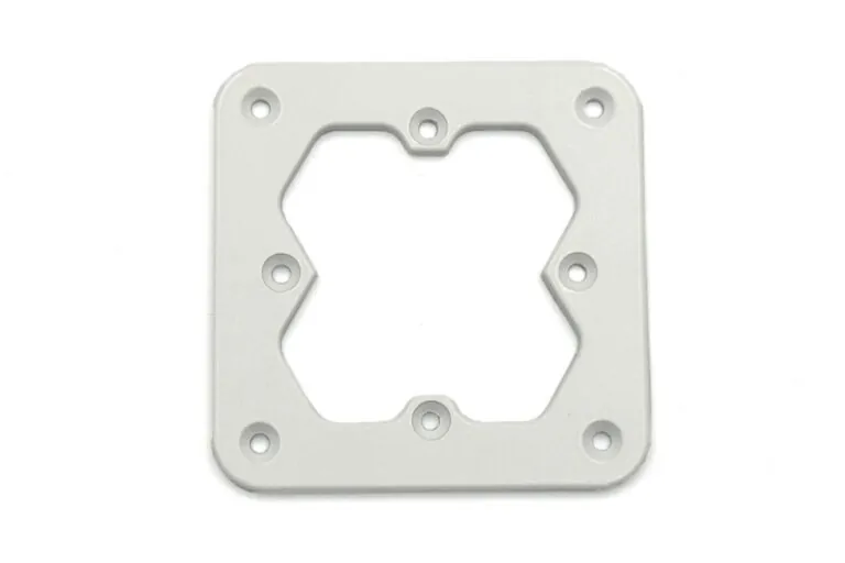 Close-up of a white powder-coated aluminum die-cast frame illustrating uniform coating thickness and clean edge definition.