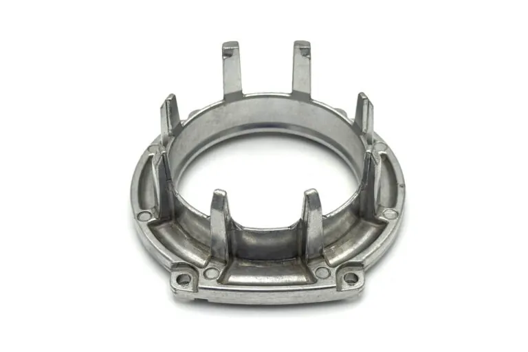 Precision aluminum die cast end caps and mounting brackets for pneumatic tool assemblies, featuring integrated alignment features.